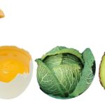 Varie verdure fresche su un tavolo, simbolo di un'alimentazione sana in gravidanza.